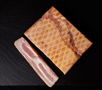 Smoked belly whole. By butchery reeks in sit